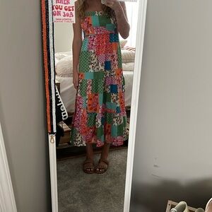 - Adorable patchwork maxi dress with a slit